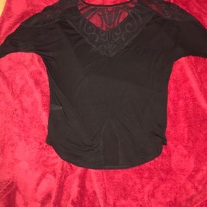 Black top with beautiful back and sleeve detail